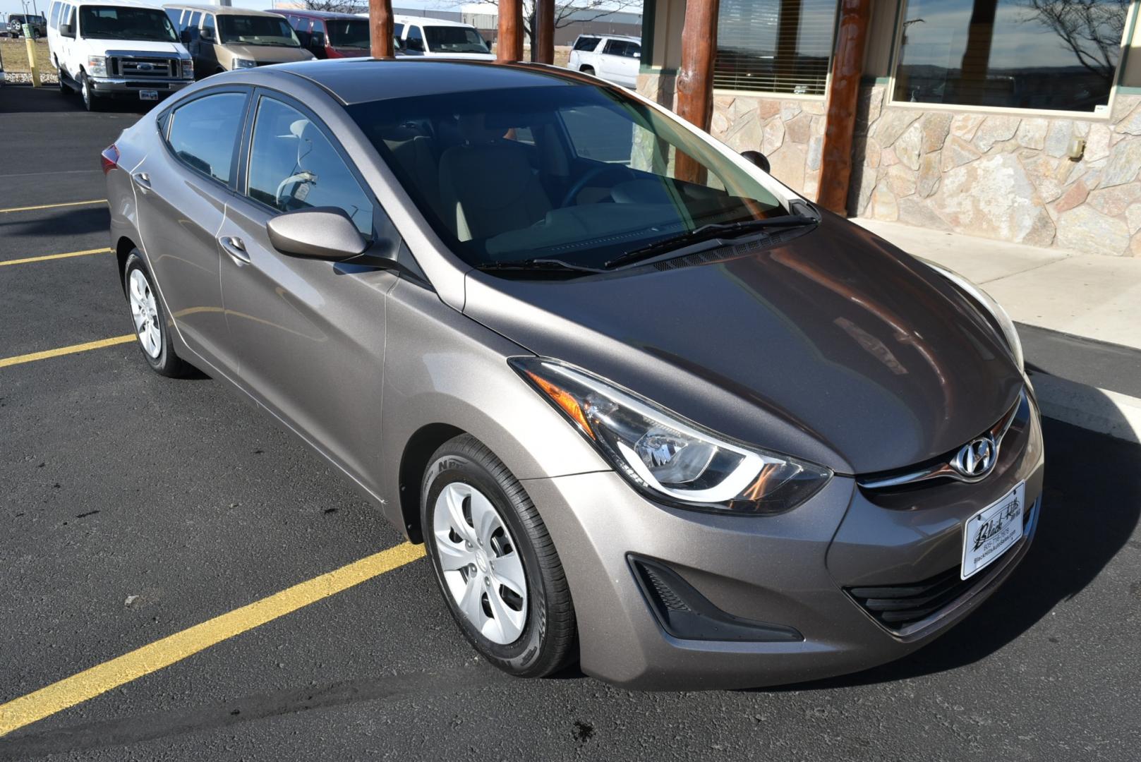 2016 Bronze Hyundai Elantra SE (5NPDH4AE3GH) with an 1.8L 4 Cyl engine, 6-Speed Automatic transmission, located at 1600 E Hwy 44, Rapid City, SD, 57703, (605) 716-7878, 44.070232, -103.171410 - Photo#0